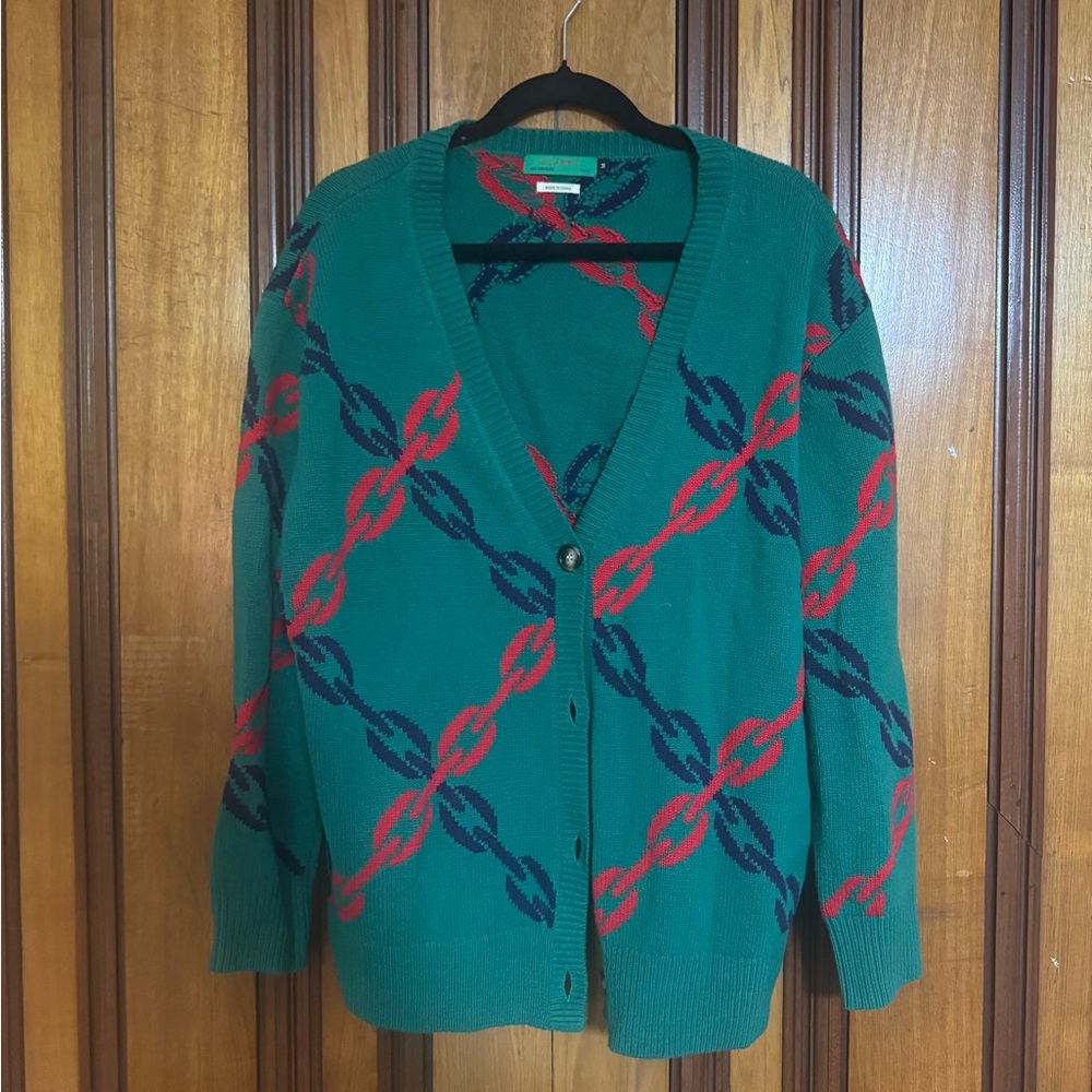 Clare V. Papi Cardigan in green with a red and blue chain pattern.